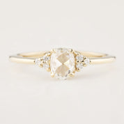 Oval rose cut 0.45ct diamond ring in 14k yellow gold with white accent diamonds in flower setting