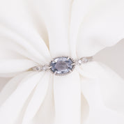 One of a kind Stella ring with 0.80ct unheated blue sapphire and 14k white gold band with accent diamonds