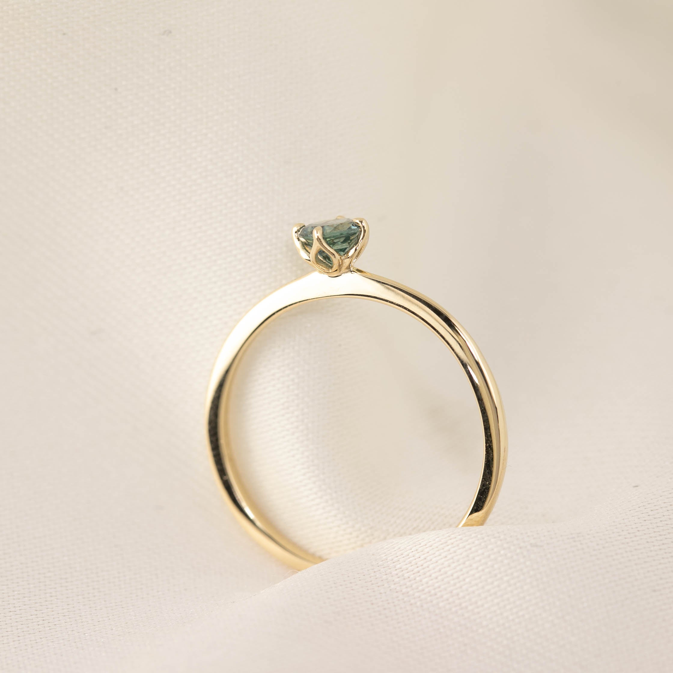Alice Ring, 0.30ct Blue Green Montana Sapphire