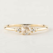 14k yellow gold Estel ring with 0.30ct rose cut diamond and two small white accent diamonds on a slim band