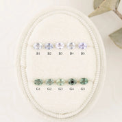 Set of blue and green sapphires with labeled positions.