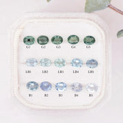 Different shades of 0.30ct oval sapphires in blue, green and blue green