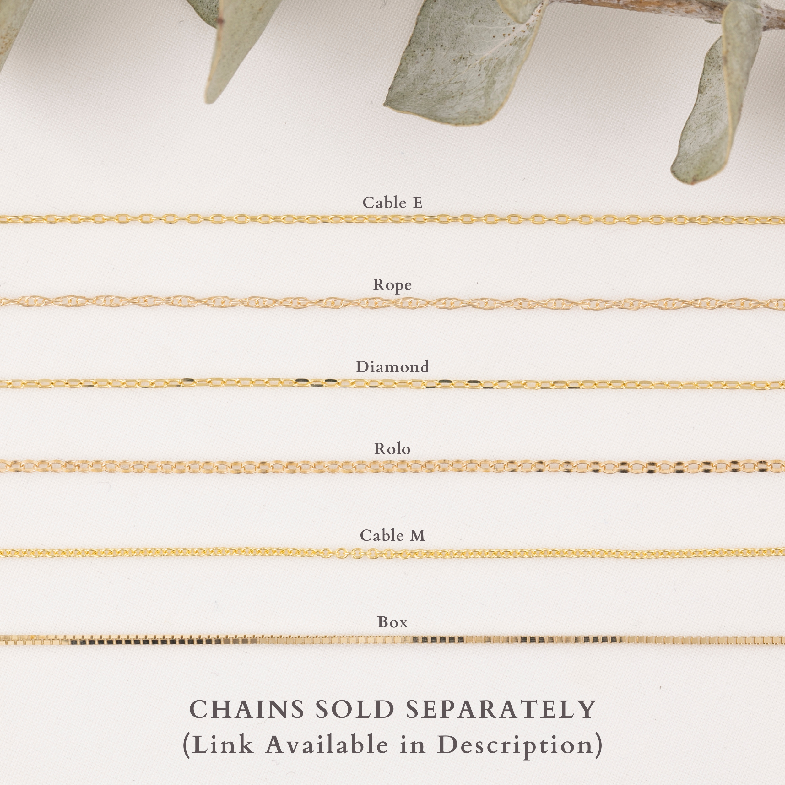 Collection of gold chains with labels on a white background