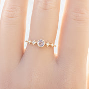 Celeste Ring, 0.25ct Unheated Sapphire on a hand