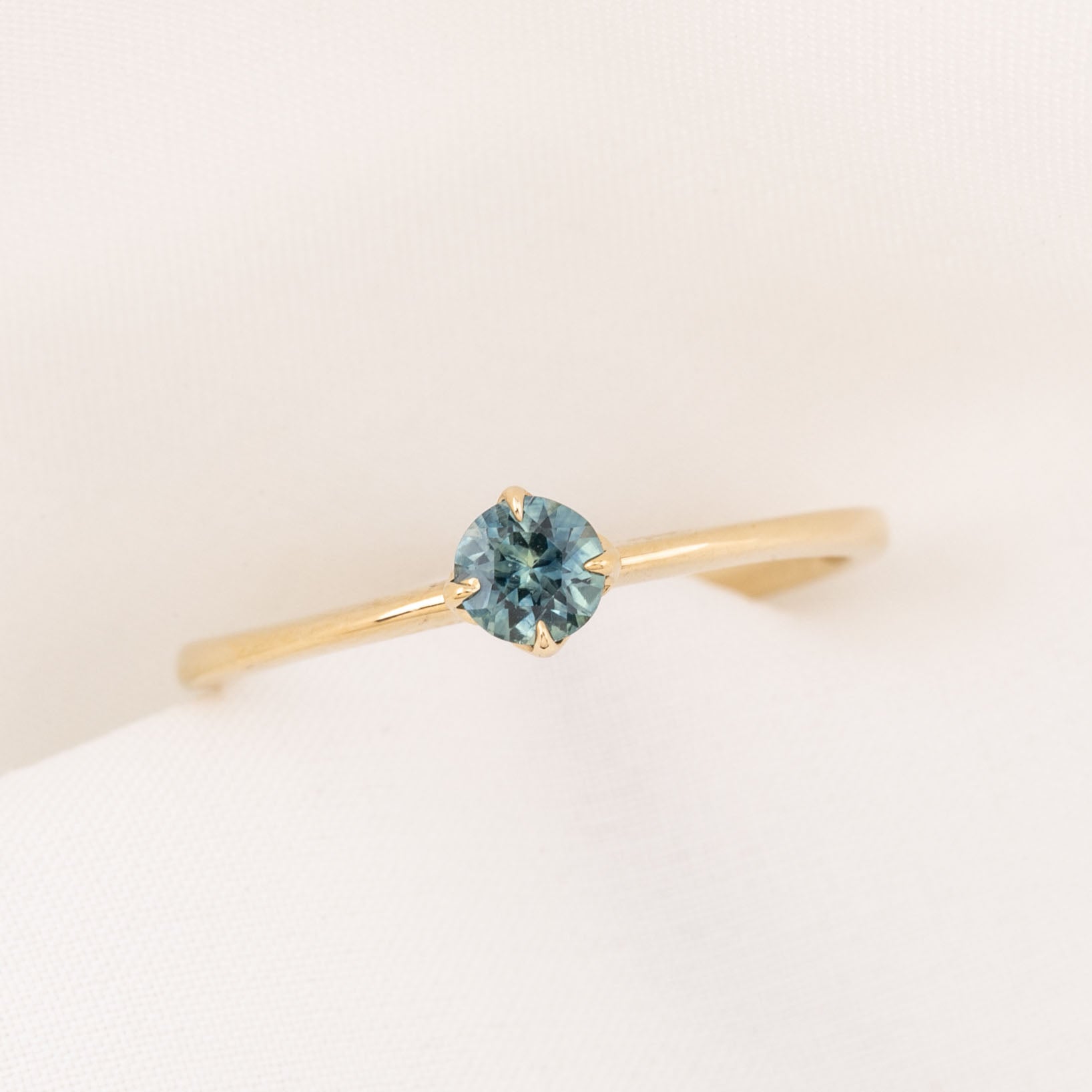 Alice Ring, 0.30ct Blue Green Montana Sapphire