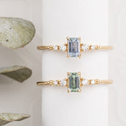 Two Estel Fleur Ring featuring a 0.45ct emerald cut Montana sapphire in 14k yellow gold