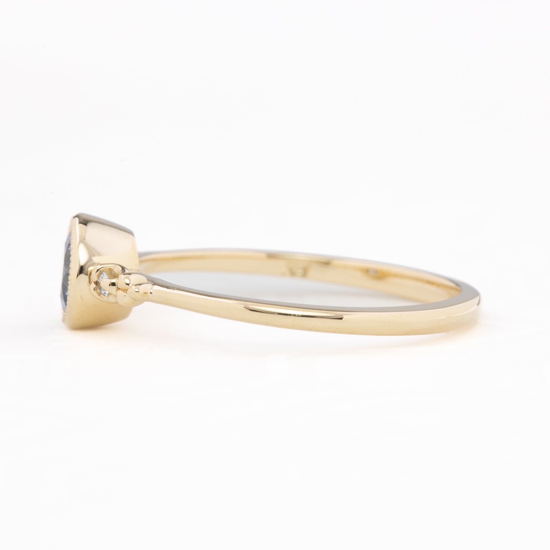 Estel Bezel Ring, 0.55ct Tunduru Sapphire