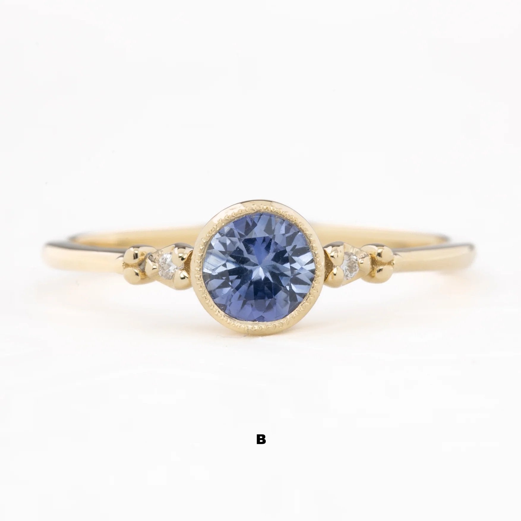 Estel Bezel Ring, 0.55ct Tunduru Sapphire
