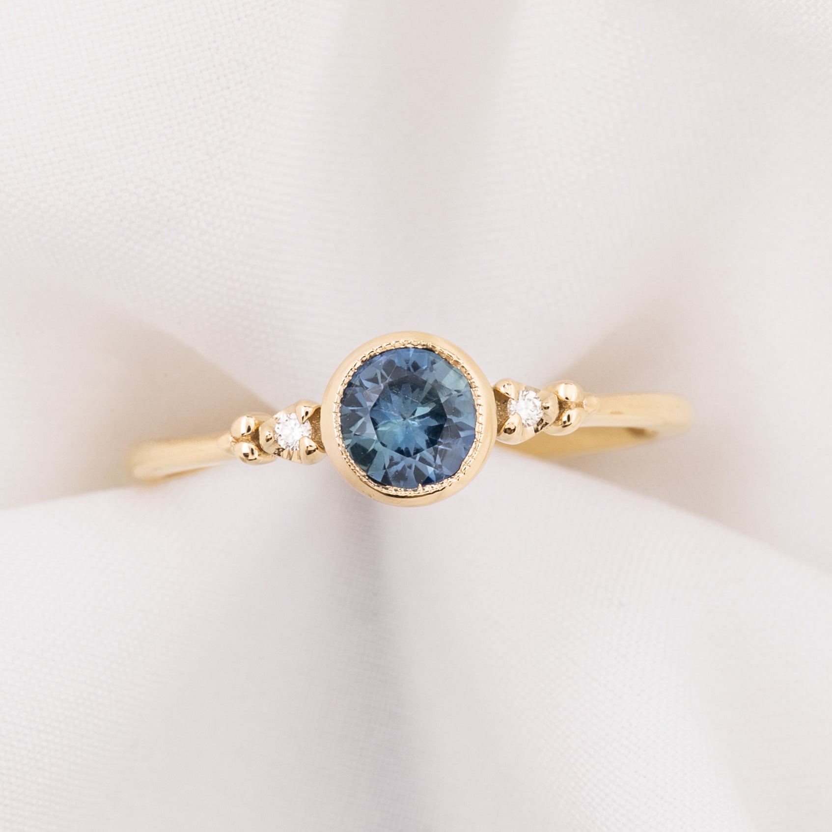 Estel Bezel Ring, 0.55ct Tunduru Sapphire