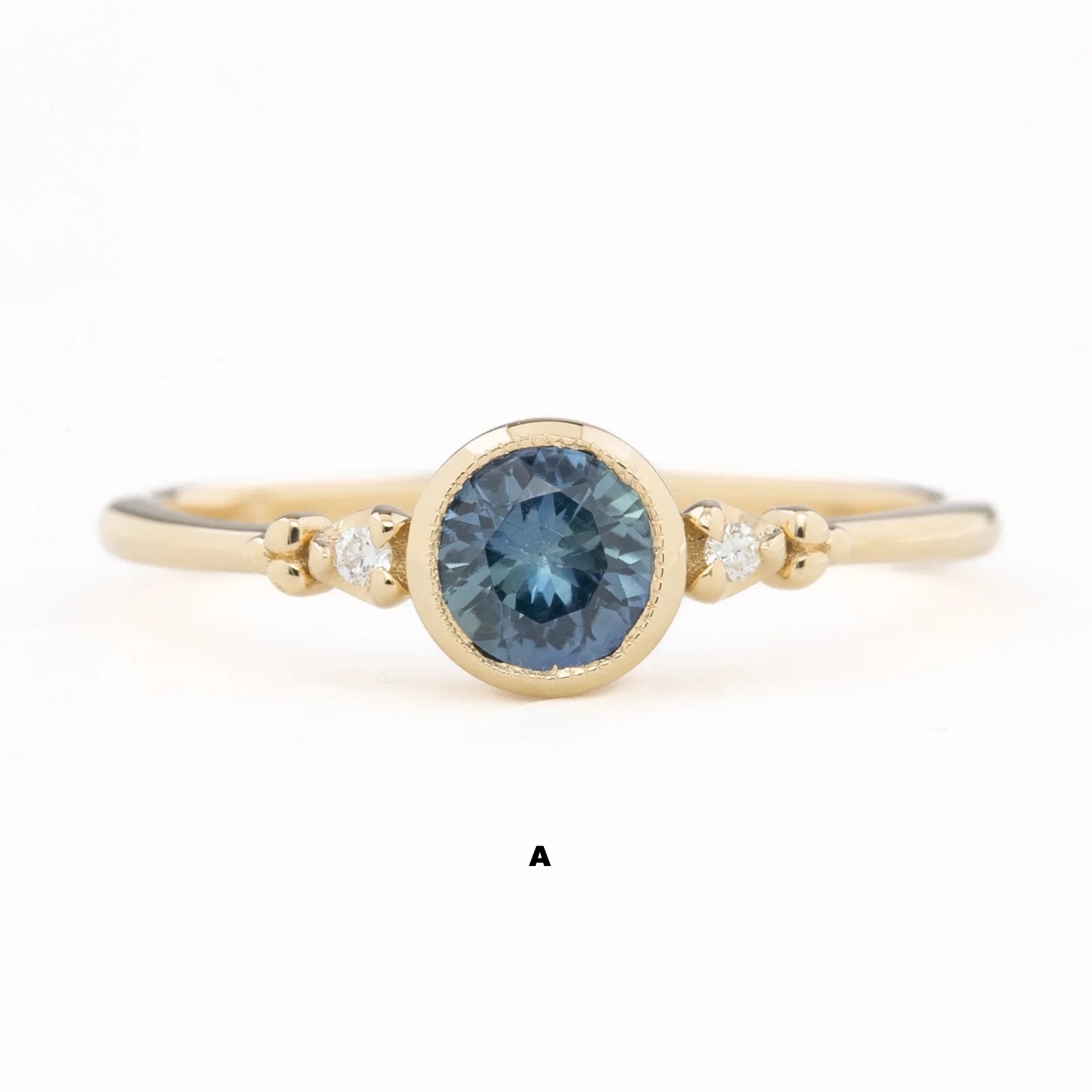 Estel Bezel Ring, 0.55ct Tunduru Sapphire