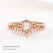 An art Deco-inspired 14k rose gold featuring a 0.45ct round rose cut diamond stacked with a band