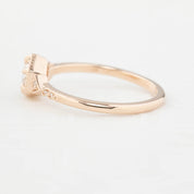 Side view of the art Deco-inspired 14k rose gold featuring a 0.45ct round rose cut diamond