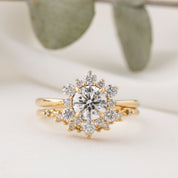Gold ring with a diamond on a light background