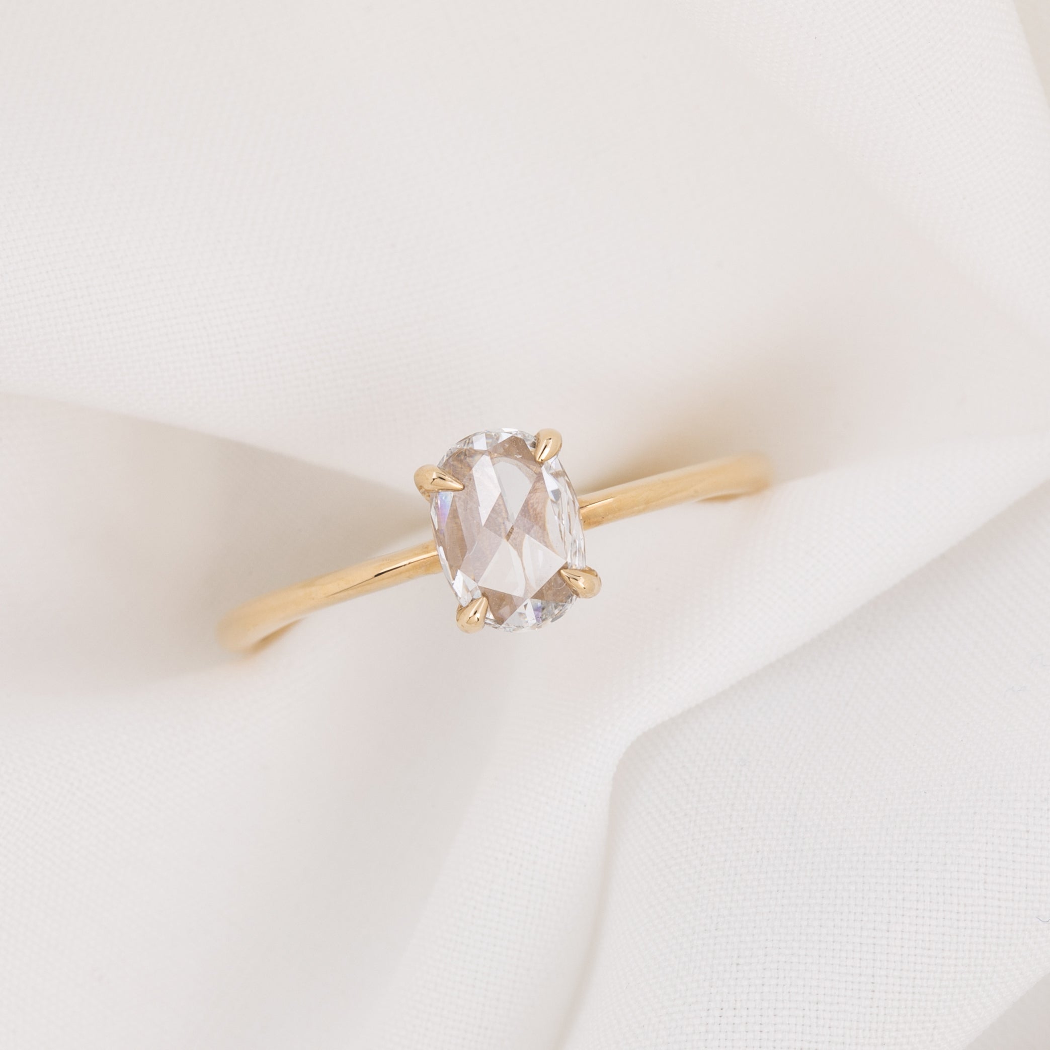 Nina Ring featuring a 0.48ct oval rose-cut diamond in 14k yellow gold, one of a kind, ethically sourced design