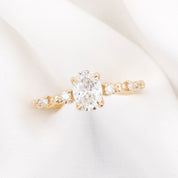 Wisteria ring 0.7ct oval diamond