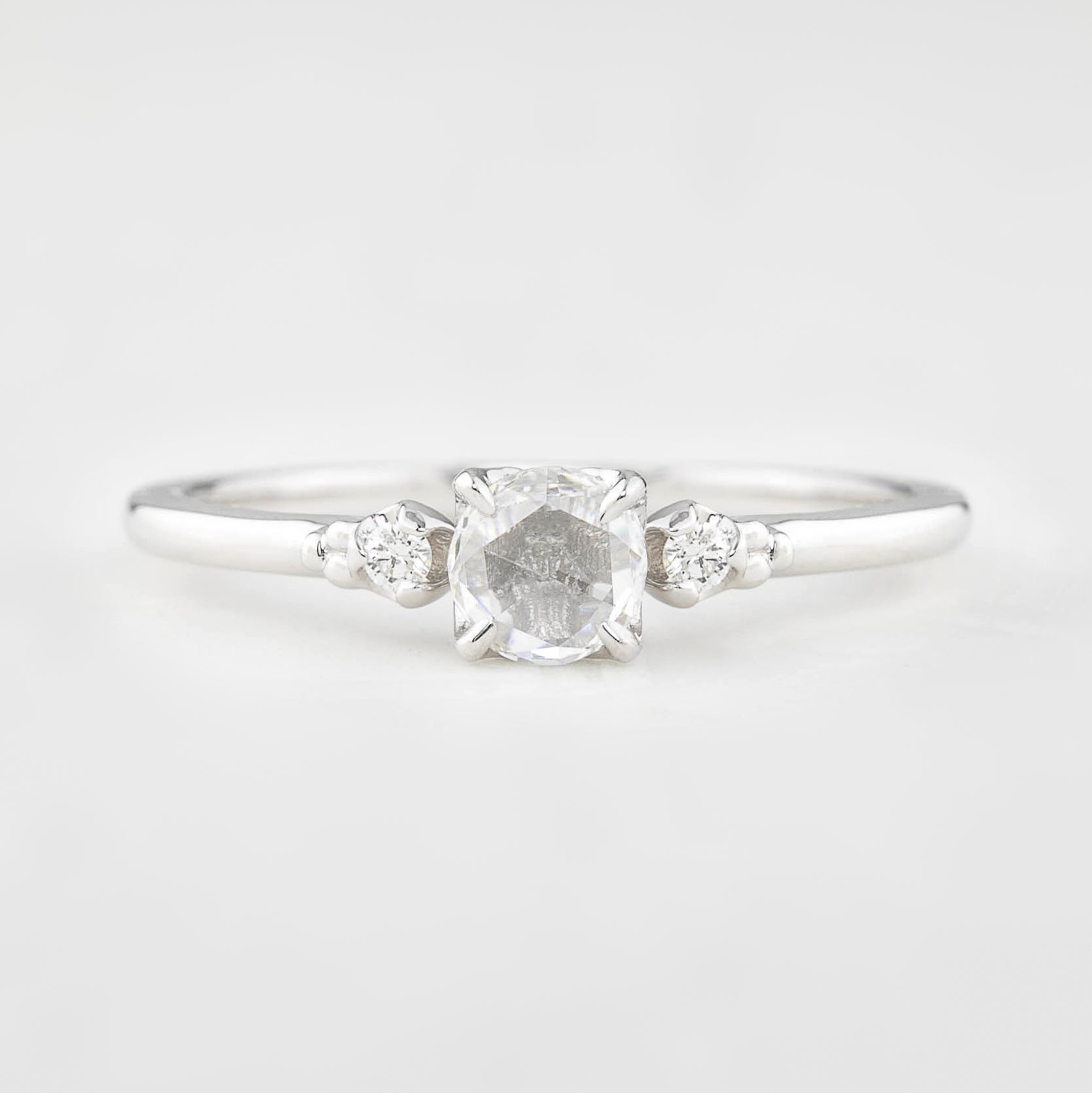 Estel ring featuring 0.30ct rose cut diamond with white accent diamonds set in 14k white gold band