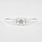 Estel ring featuring 0.30ct rose cut diamond with white accent diamonds set in 14k white gold band