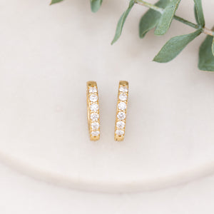 14K gold 15mm diamond huggie earrings with natural diamonds
