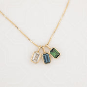 Patia Emerald-Cut Montana Sapphire Charm