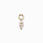 Gold pendant with a clear gemstone on a white background