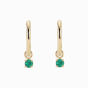 Gold hoop earring with measurements of appx 13.5mm diameter on a white background