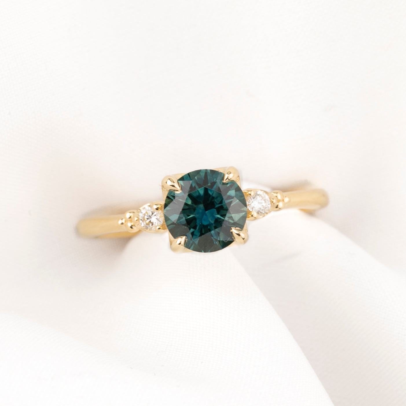 Estel Ring, 1.14ct Blue green Montana Sapphire