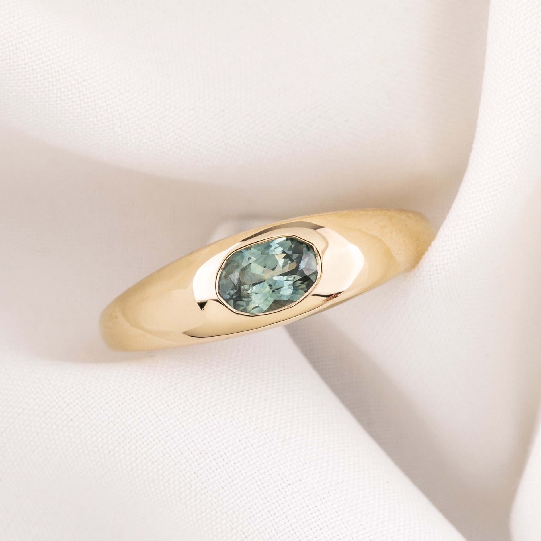 Dome Ring, 0.61ct Montana Sapphire, oval shape gemstone