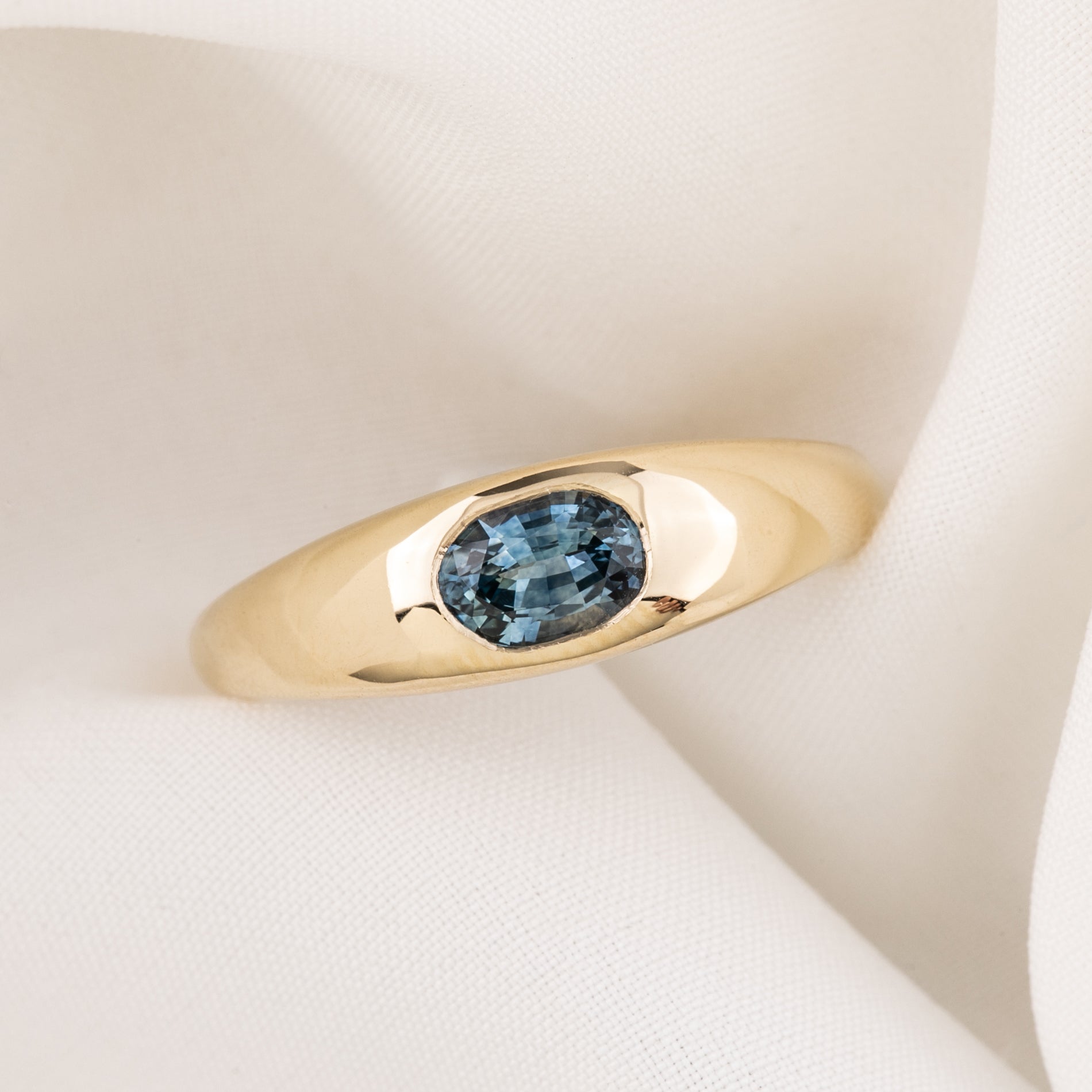 Dome Ring, 0.60ct Montana Sapphire, oval shape gemstone