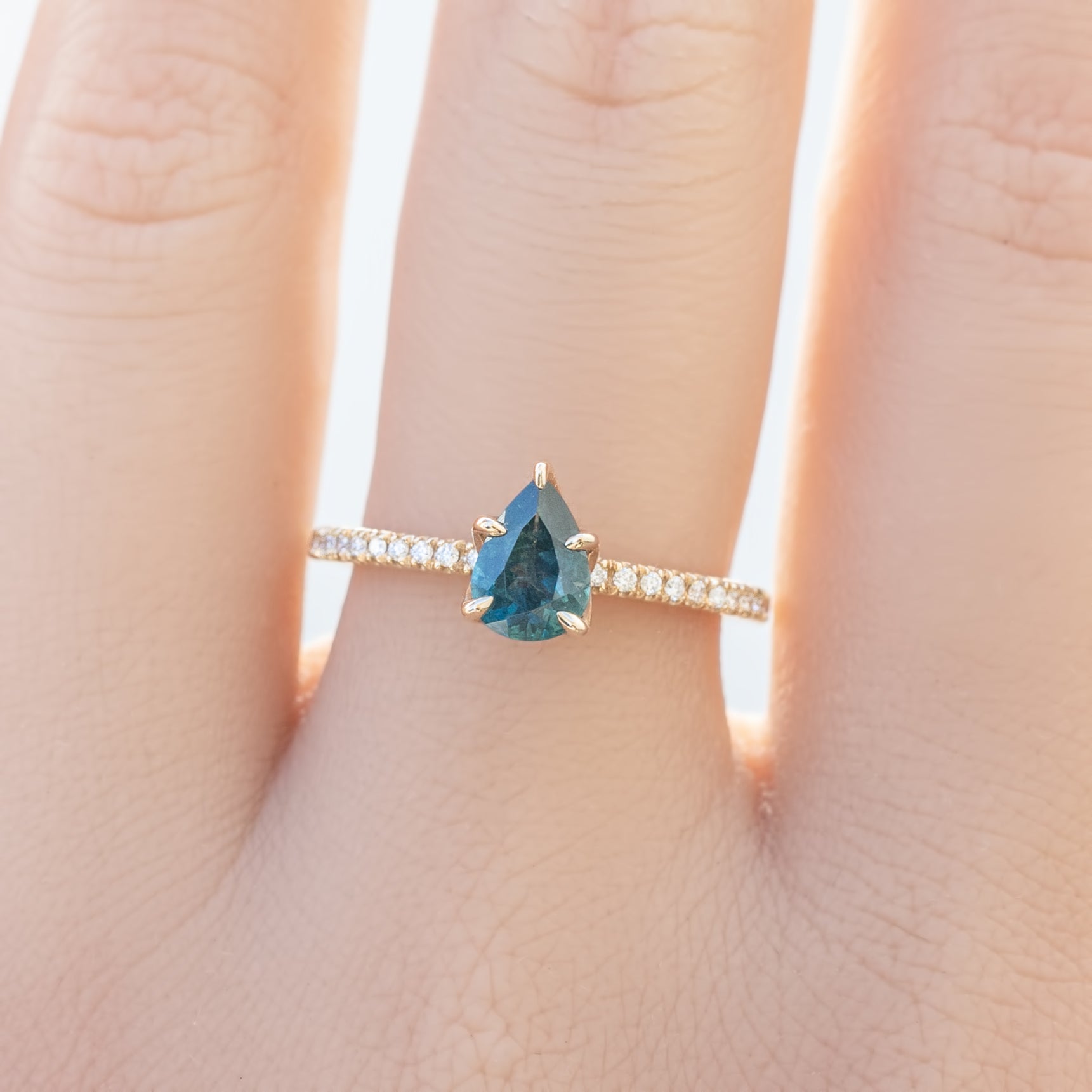 Maria Ring 0.8ct Montana Sapphire with diamond accents set in recycled 14k yellow gold, handmade and ethically sourced.