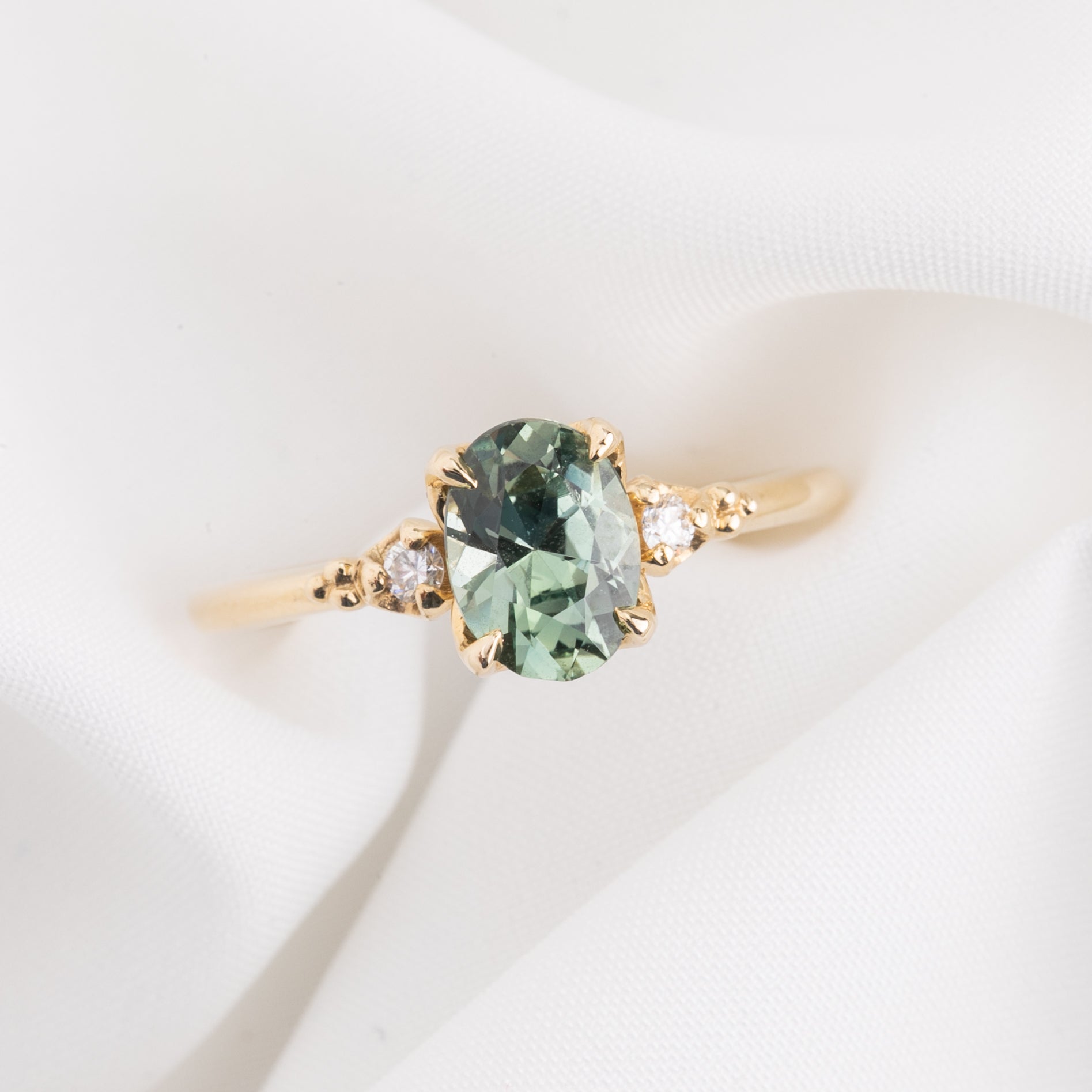 Estel Ring 1.28ct Light Blue Green Oval Montana Sapphire, 14K Yellow Gold (One of a kind)