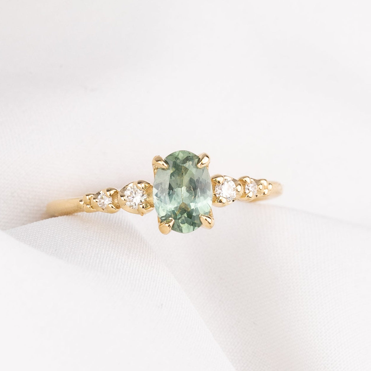 Estel Fleur Ring, 0.86ct Light Blue Green Montana Sapphire