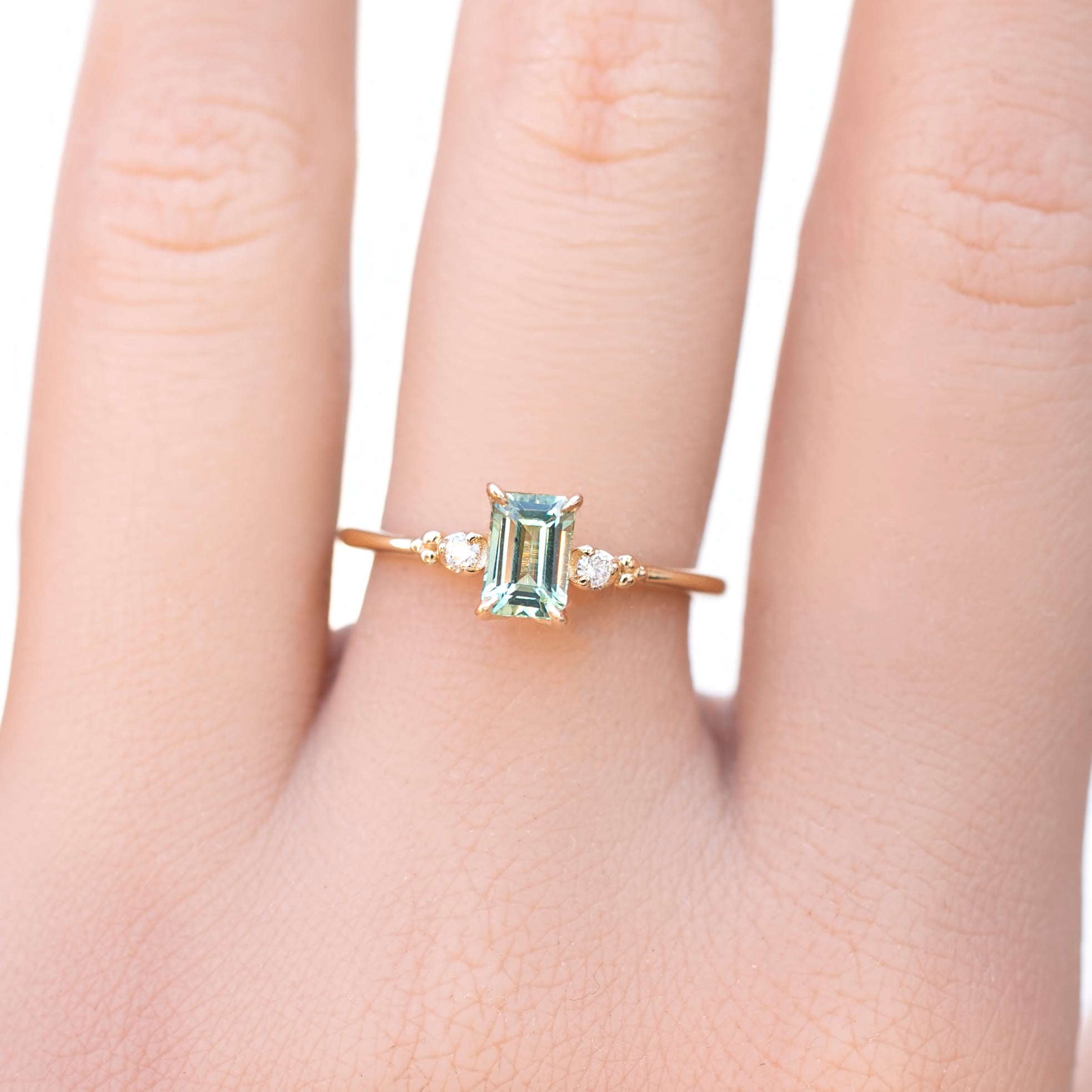 Estel Ring, 0.81ct Emerald Montana Sapphire