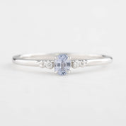Estel Ring featuring a 0.20ct light blue unheated oval sapphire and 14k white gold diamond accents