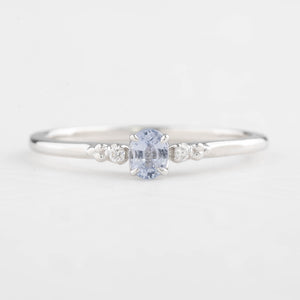 Estel Ring featuring a 0.20ct light blue unheated oval sapphire and 14k white gold diamond accents
