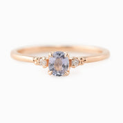 Estel Ring featuring a 0.40ct light blue unheated oval sapphire and 14k rose gold diamond accents