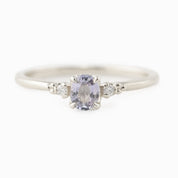 Estel Ring featuring a 0.40ct light blue unheated oval sapphire and 14k white gold diamond accents