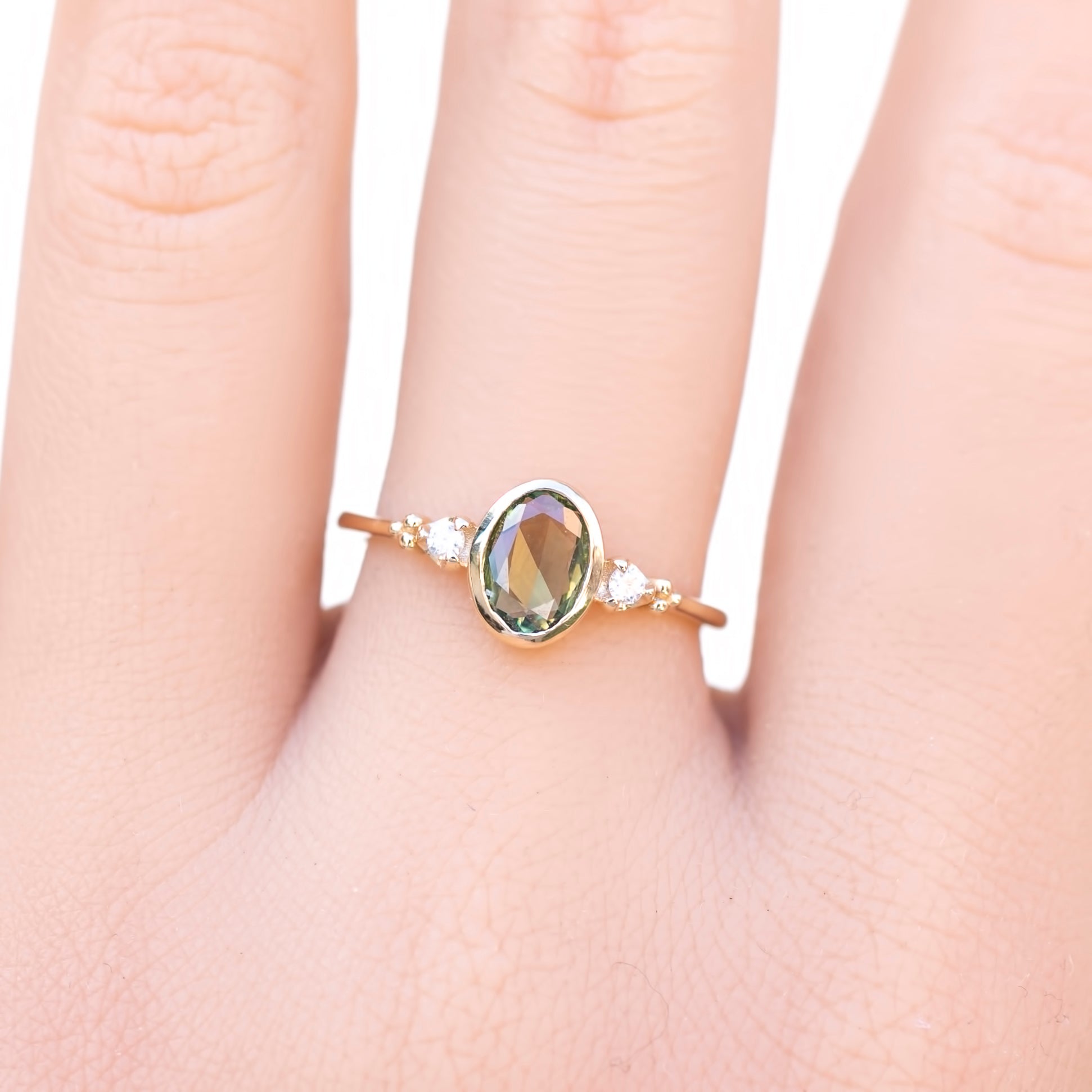 Estel Bezel Ring, 0.60ct Green Sapphire, oval shape gemstone