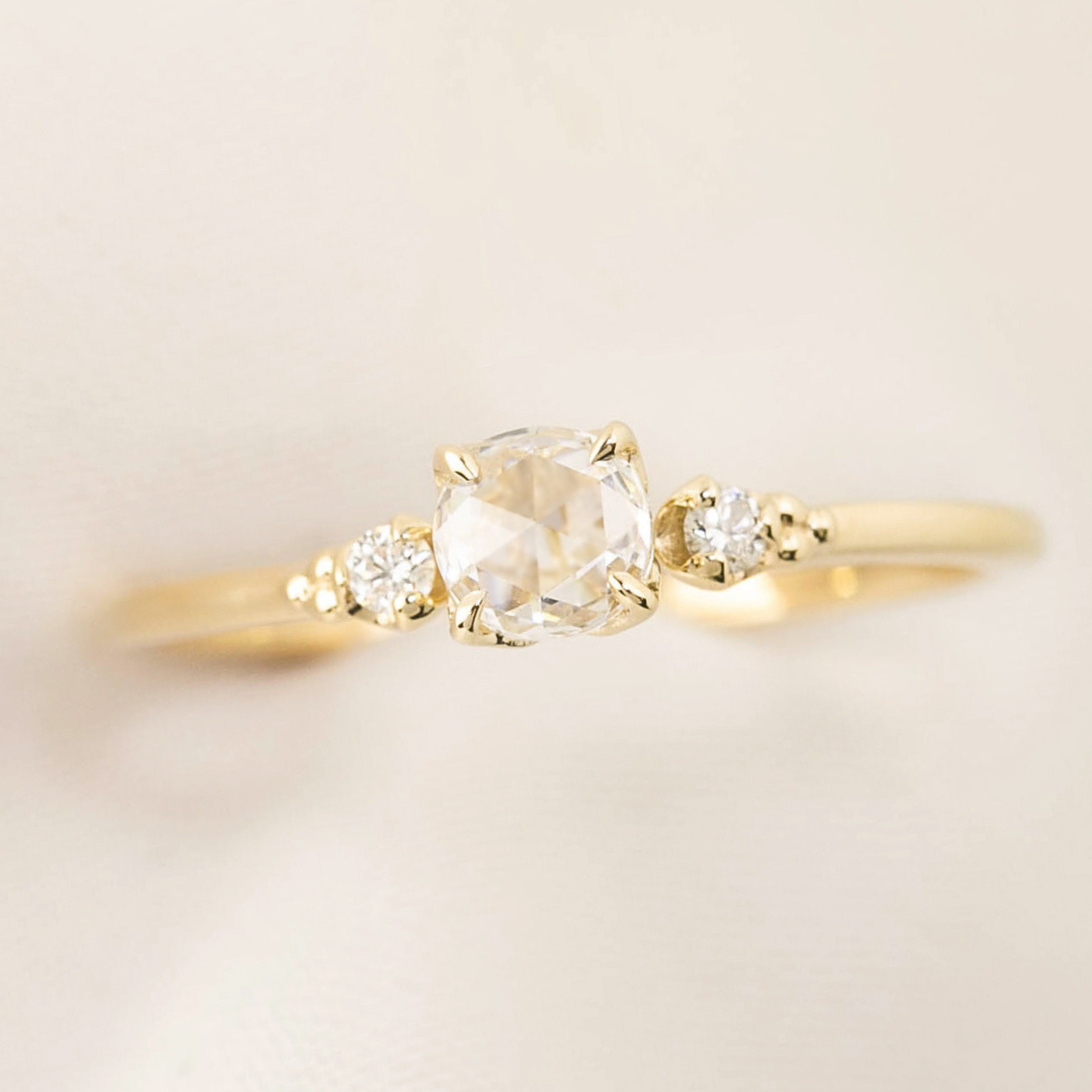 Estel ring with 0.30ct rose cut diamond and white accent diamonds in 14k yellow and white gold band