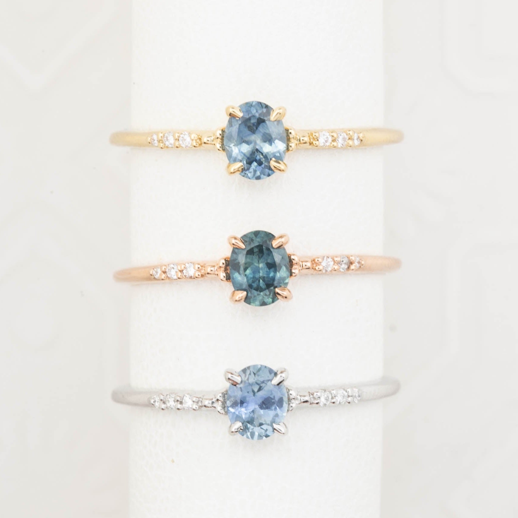 3 Eloise Ring with a 0.45ct Montana oval sapphire and diamond pave band in 14k yellow gold, rose gold, white gold.