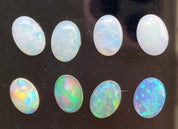 0.50ct Calibrated White and Rainbow Opal (7x5mm)