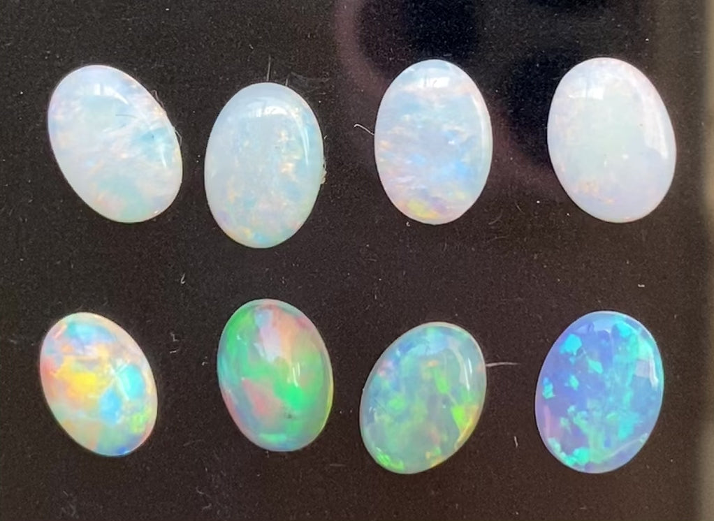 0.50ct Calibrated White and Rainbow Opal (7x5mm)