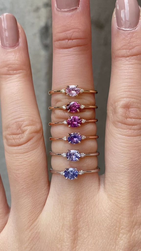 Six Emilie 0.45ct Umba sapphire ring worn to show the unique horizontal orientation  in different materials worn on finger.