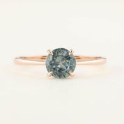 Close-up of Nina Ring with 0.98ct light green Montana sapphire set in 14k rose gold tapered band