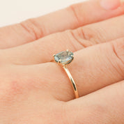 Sara Ring with 1.00ct parti blue green Montana sapphire set on a 14k yellow gold band, size 7 worn on hand.