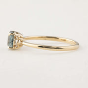 Close-up side view of Lena Ring featuring 1.14ct Montana sapphire and diamond accents in 14k gold band