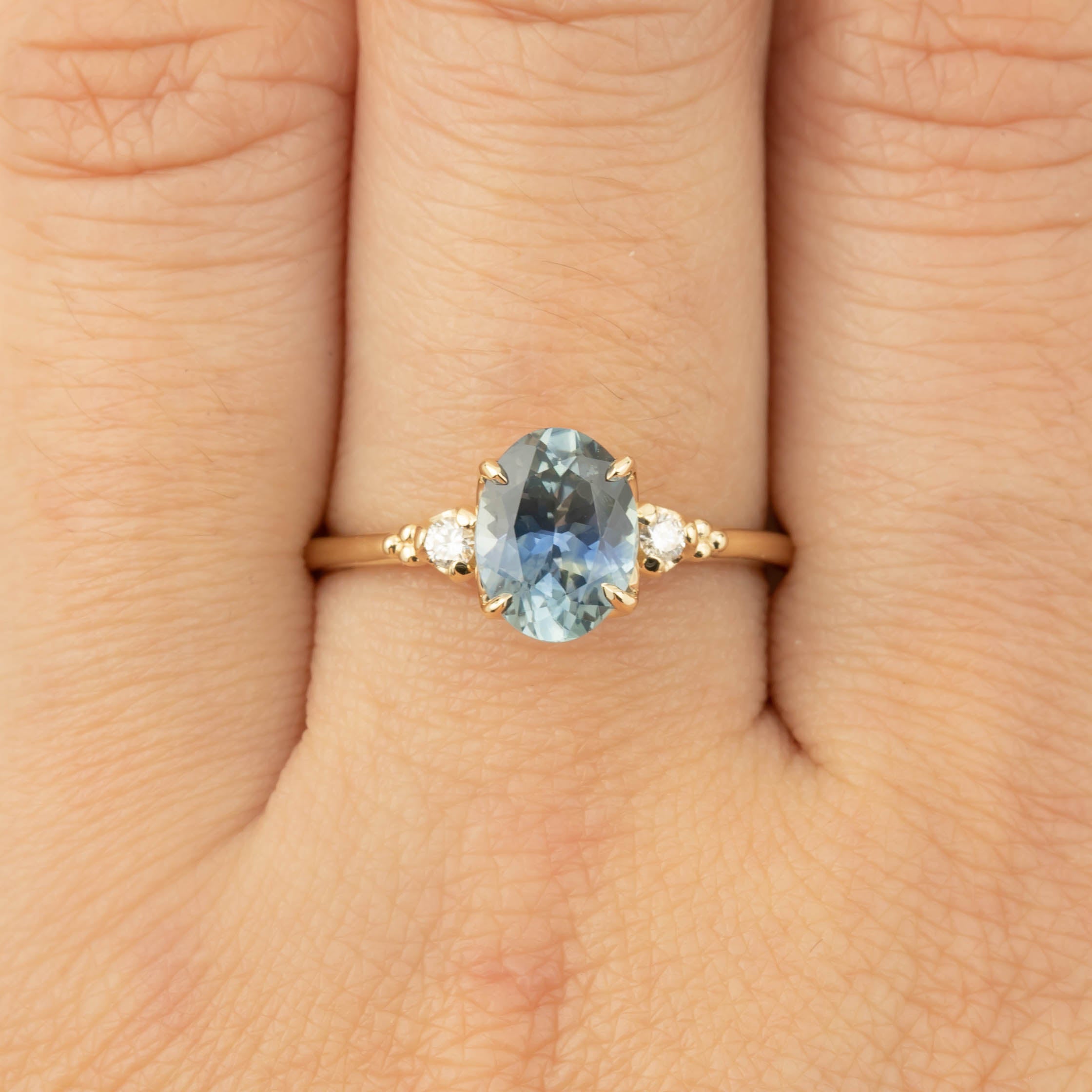 Estel ring with 1.62ct teal Montana sapphire and diamond accents set in recycled 14k gold band size 7.