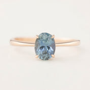 Elegant Nina Ring with 1.4ct blue Montana sapphire set in recycled 14k rose gold, size 7, four-prong setting