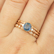 14k rose gold Estel ring with 1.24ct blue sapphire and diamond accents on finger size 7.