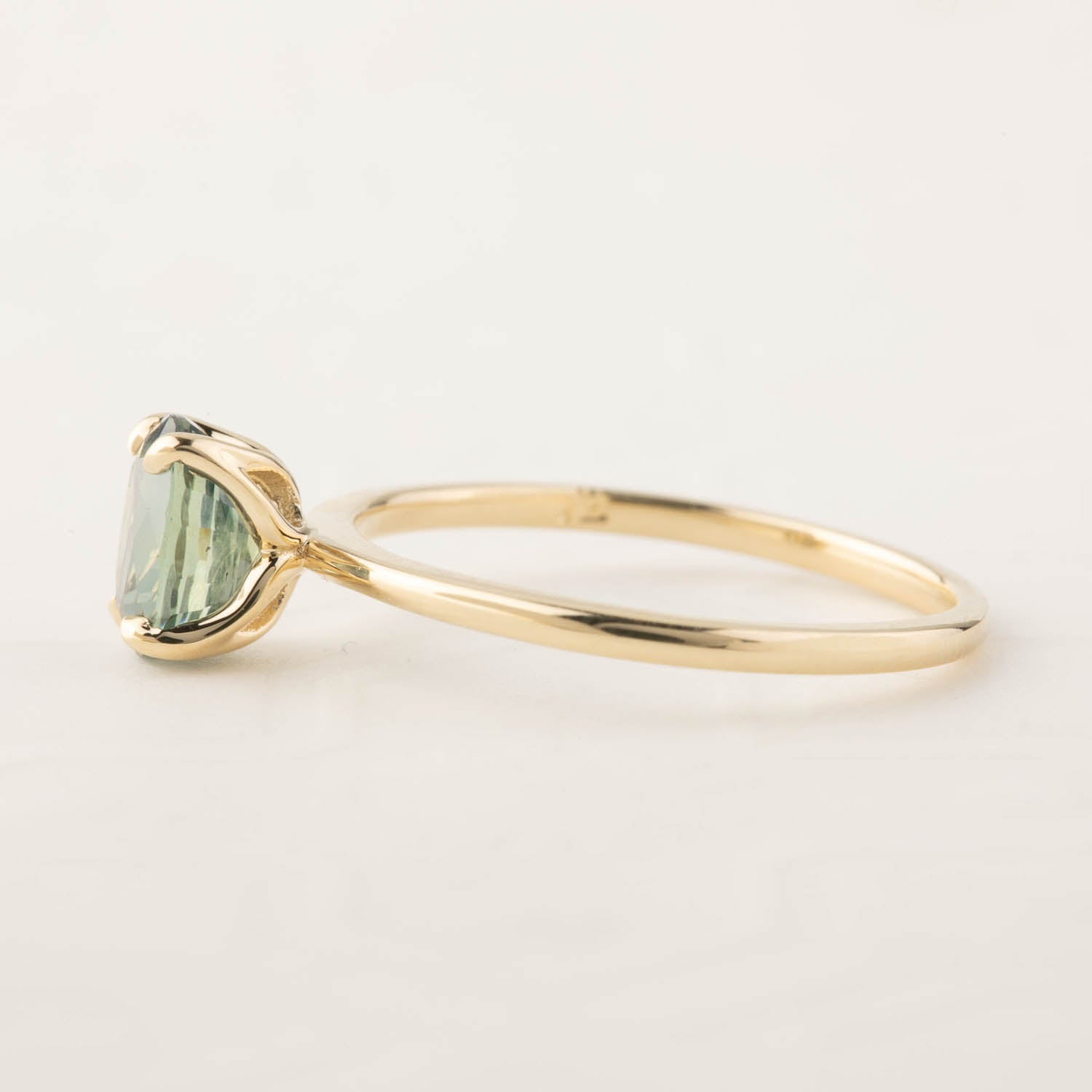 14k yellow gold ring with 1.36ct peacock green sapphire in a high profile flower setting, size 7 adjustable 4-8.5