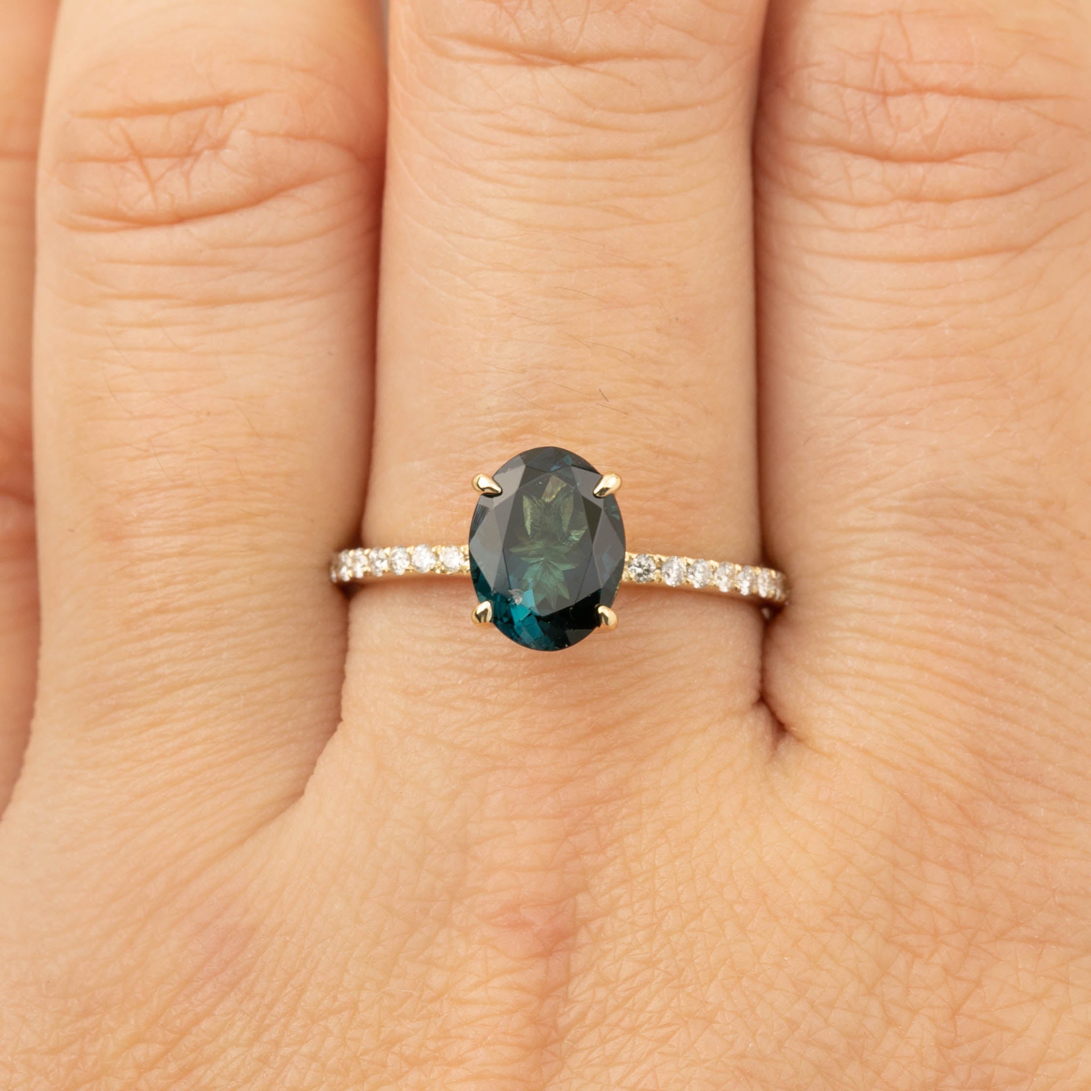Elegant Maria Ring with 1.64ct green tourmaline and diamond pave band in 14k recycled yellow gold
